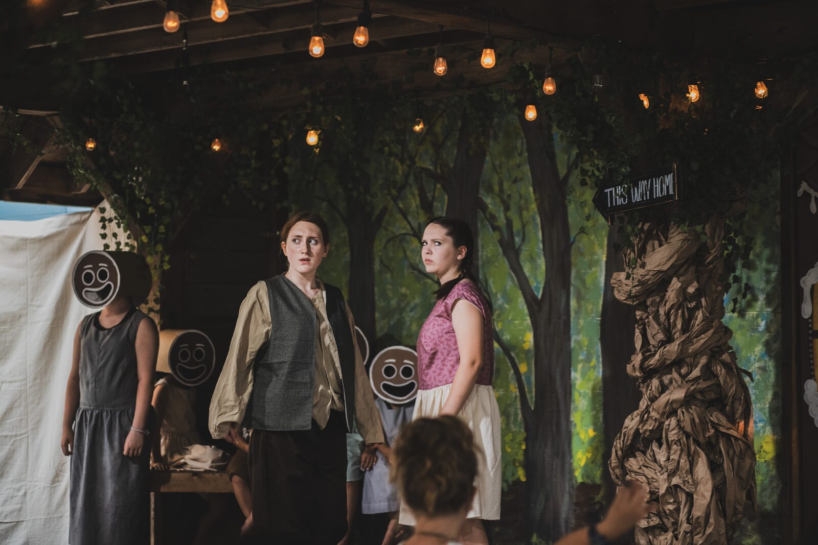 Hansel and Gretel on stage with the ensemble